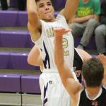 Ozell Jackson scores for Oak Harbor Saturday. (Photo by Jim Waller)