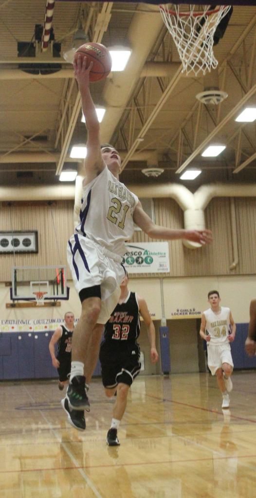 Adam Nelson goes to the hoop on a break away against Mount Baker. (Photo by Jim Waller)