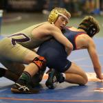 Oak Harbor&rsquo;s Lucas Nickelson, left, prepares to wrestle at the Edmonds Invitational Saturday. (Photo by John Fisken)