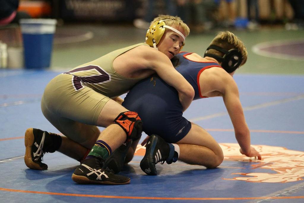 Oak Harbor&rsquo;s Lucas Nickelson, left, prepares to wrestle at the Edmonds Invitational Saturday. (Photo by John Fisken)
