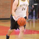 Eric Collins, boys JV basketball coach at OHHS, begins to set up the offense. (Photo by John Fisken)