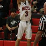 Hunter Smith fires up a shot in the Wolves&rsquo; win over Klahowya Dec. 13. His efforts in the game earned him WIAA Athlete of the Week honors. (Photo by Jim Waller)