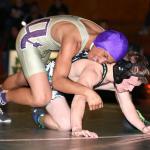 Zion Gomez, top, battles a Mount Vernon wrestler in Thursday&rsquo;s match. (Photo by John Fisken)