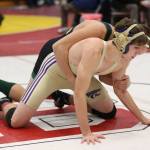 Wildcat Ethan Pace, front, takes on Sehome&rsquo;s Andy Waters. (Photo by John Fisken)
