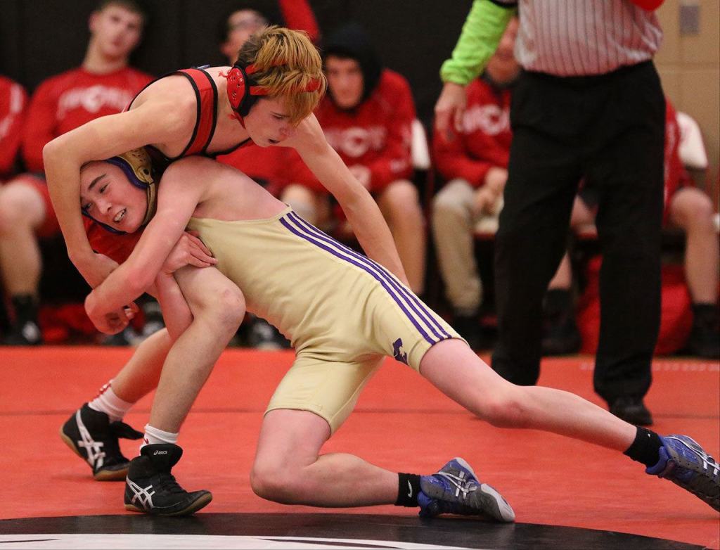 Dawson Seabolt, right, fights for a takedown against Snohomish. (Photo by John Fisken)