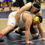 Sam Zook tangles in the championship match Saturday. (Photo by John Fisken)
