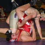 Sam Zook stacks up his opponent for a fall in the M-P match. (Photo by John Fisken)