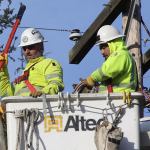 Utility workers work to restore power on Terry Road in Coupeville Saturday, Jan. 14, 2017.