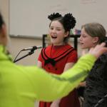 Mary Kate Place and fellow drama club student Hayden Daniel from Coupeville Elementary School rehearse for the musical &lsquo;James and the Giant Peach Jr.&rdquo; Thursday, Jan. 26, 2017 in the school&rsquo;s multi-purpose room. Cheridan Eck, foreground, volunteers as the production&rsquo;s choreographer. Photo by Ron Newberry/Whidbey News-Times