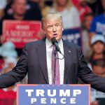 Andy Bronson / The Herald                                Donald Trump speaks to a nearly full arena of supporters during a pre-election rally at Everett&rsquo;s Xfinity Arena Aug. 30.