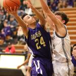 Haven takes the ball to the hoop at Meridian Friday. The sophomore led the Wildcats in scoring and rebounding in the non-league game. (Photo by John Fisken)