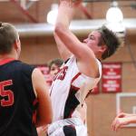 Hunter Downes puts up a jumper Tuesday. (Photo by John Fisken)