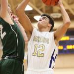 Wildcat Ozell Jackson puts up a shot in Friday&rsquo;s game with Shorecrest. (Photo by John Fisken)