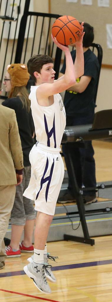 Gabe Salinger puts up a jumper in Friday&rsquo;s game with Everett. (Photo by John Fisken)