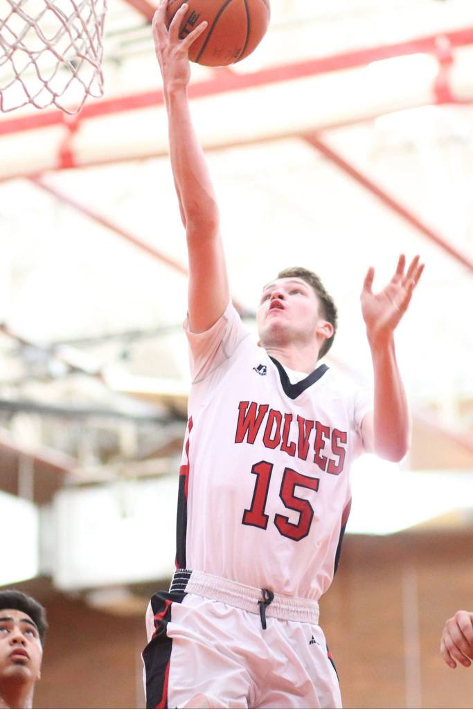 Brian Shank converts a layup in Friday&rsquo;s game with Port Townsend. (Photo by John Fisken)