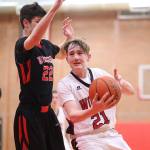Ethan Spark tries to get around the defense of Noa Montoya. (Photo by John Fisken)