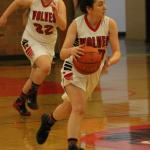 Coupeville&rsquo;s Kalia Littlejohn leads a fast break after a steal as Tiffany Briscoe hustles to fill a lane. (Photo by Jim Waller/Whidbey News-Times)