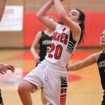 Kalia Littlejohn splits the Sequim defense for a bucket. (Photo by John Fisken)