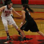 Wolves lock up third straight title / Girls basketball