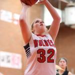 Tiffany Briscoe scores in the win over Klahowya Saturday. (Photo by John Fisken)