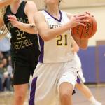Mikhaela Cortez powers to the hoop for Oak Harbor. (Photo by John Fisken)