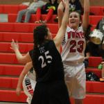 Coupeville&rsquo;s Mikayla Elfrank shoots over Klahowya&rsquo;s Kayla Hendricks. (Photo by Jim Waller/Whidbey News-Times)