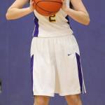 Emily Gouge looks to pass for the Wildcats. (Photo by John Fisken)