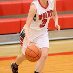 Lauren Grove looks to set up the offense against Klahowya. (Photo by John Fisken)