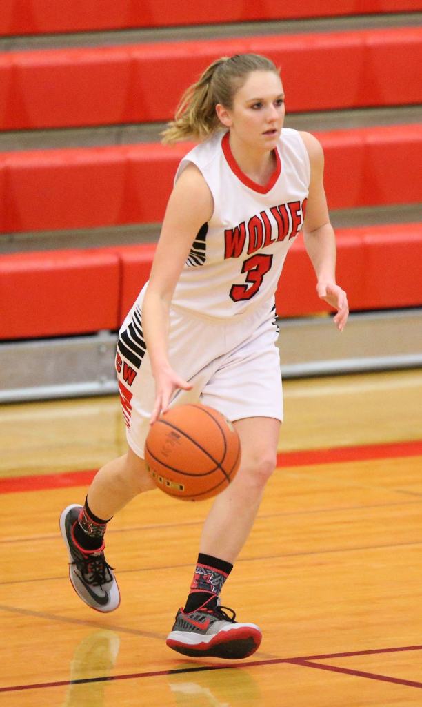 Lauren Grove looks to set up the offense against Klahowya. (Photo by John Fisken)