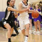 Oak Harbor&rsquo;s Bryn Langrock beats Davi Borromeo off the dribble. (Photo by John Fisken)