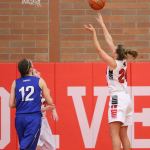 Lindsey Roberts records a bucket in Friday&rsquo;s win as Chimacum&rsquo;s Alice Yaley (12) looks on. (Photo by John Fisken)