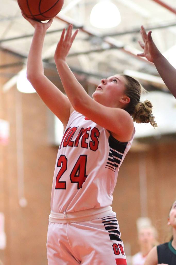 Lindsey Roberts powers up for a two points against Klahowya. (Photo by John Fisken)