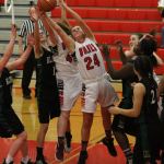 Lindsey Roberts (24) grabs one of her 11 rebounds. (Photo by Jim Waller/Whidbey News-Times)