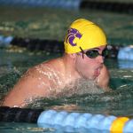Kenneth Morrow swims his way to a win in the 100-meter breaststroke. (Photo by John Fisken)