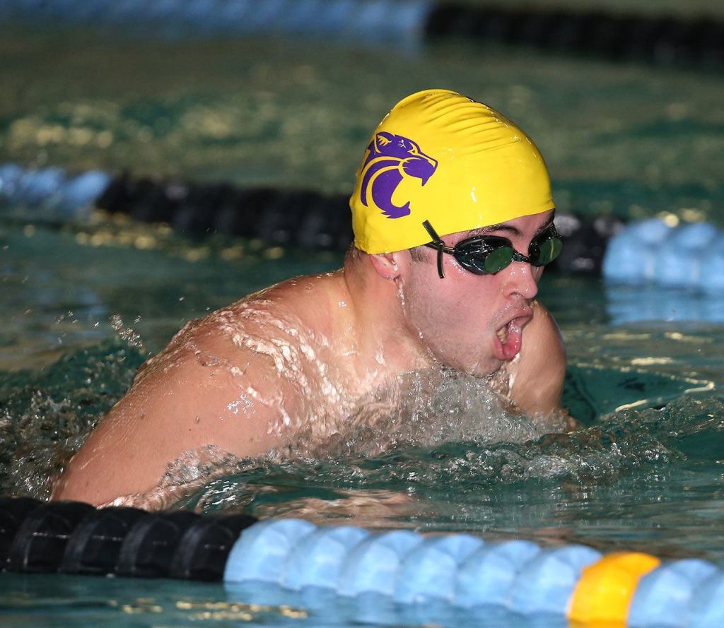 Kenneth Morrow swims his way to a win in the 100-meter breaststroke. (Photo by John Fisken)