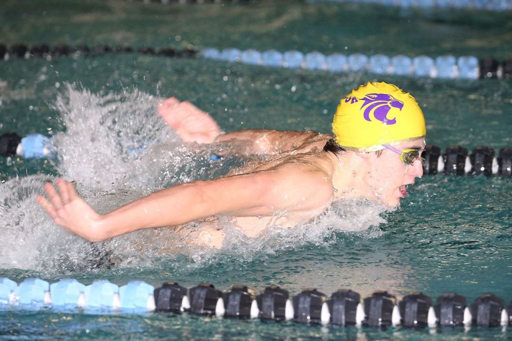 Enrique Perez won two individual events Monday, including the 100-meter butterfly. (Photo by John Fisken)