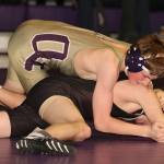 Sydney Thomas gets ready to turn Getchell&rsquo;s Joshua Turner on the way to a first period pin. (Photo by John Fisken)