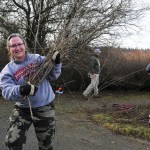 Valerie Matazzoni, a retired Navy veteran, participates in a veteran volunteer project along with the National Parks Conservation Association to help maintain the Prairie Wayside portion of Ebey&rsquo;s Prairie in Coupeville Monday. Photo by Michael Watkins/Whidbey News-Times