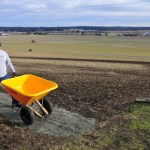 Thomas Skurnick, a second class petty officer from NAS Whidbey Isand, helps to restore the prairie overlook trail at Ebey&rsquo;s National Historical Reserve, Monday in Coupeville.The project was part of a veteran&rsquo;s group project along with members of the National Park Conservation Association to help out with a backlong of needed maintenance in the National Park System. Photo by Michael Watkins/Whidbey News-Times