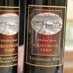 Loganberry wines that made Greenbank Farm famous continue to be big sellers by the new wine shop owners. Photo by Patricia Guthrie/Whidbey News-Times