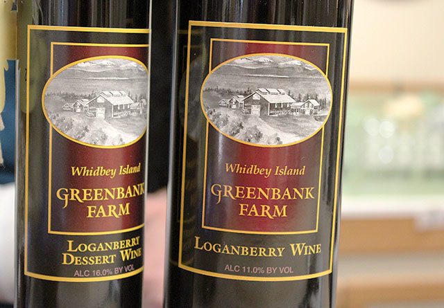 Loganberry wines that made Greenbank Farm famous continue to be big sellers by the new wine shop owners. Photo by Patricia Guthrie/Whidbey News-Times