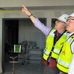 Photo by Michael Watkins/Whidbey News-Times Keith Mack, left, manager of marketing and community relations and George Senerth, executive director of facilities, both with Whidbey Health Medical Center, tour new construction of the hospital Monday in Coupeville.