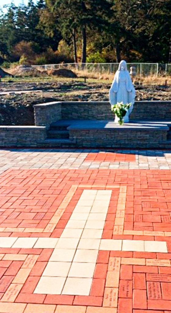 The Virgin Mary statue in the Our Lady Plaza at St. Augustine Prayer Garden before being knocked down this week. Contributed photo by St. Augustine Catholic Church