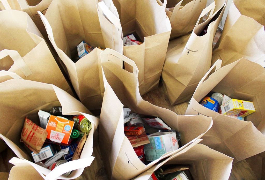 The Food4Kids program delivers groceries to 86 students at five Oak Harbor elementary schools to help get them through the weekend. Local company, Idex Health & Science, recently donated $10,000 toward the Rotary Club program.                                Photo by Patricia Guthrie/Whidey News-Times