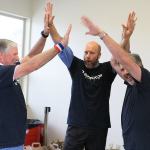 Team Teminator celebrates after winning the &ldquo;Fill Off&rdquo; grocery bag contest held Thursday by the Rotary Club of Oak Harbor. Ken Hulett (left) Kurt Schonberg (center) and Steve Schwalbe proved loading two grocery bags at a time is faster that the one-bagger method.                                Photo by Patricia Guthrie/Whidbey News-Times