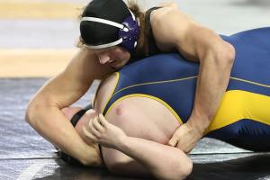 Zook handles pressure, opponents to win state title / Wrestling
