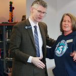 Paula Seaman, principal of Hillcrest Elementary, accepts the honor of Regional Principal of the Year from OHSD Superintendent Dr. Lance Gibbon in front of her staff and faculty last week in Oak Harbor. Photo by Daniel Warn/Whidbey News-Times