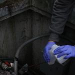 A sampler from CH2M, a global engineering company and contractor for the Navy, tests water from the community wells at the Admiral&rsquo;s Cove Water District Monday, Feb. 20, 2017. The tests were conducted to look for certain chemicals that might&rsquo;ve come from Coupeville&rsquo;s Outlying Landing Field. Photo by Ron Newberry/Whidbey News-Times.