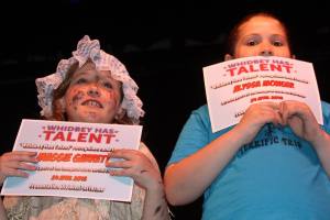 Maggie Garrett, left, and Alyssa Monger hold up certificates after participating in the first &lsquo;Whidbey Has Talent&rsquo; at Oak Harbor High School last year. Photo by Ron Newberry/Whidbey News-Times