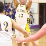 Joe Arinaza shoots for Oak Harbor in Tuesday&rsquo;s win. Arinaza opened the game by draining a three-pointer. (Photo by John Fisken)